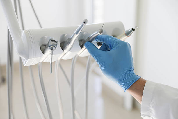Professional Tooth Extraction technician working in Sandy Springs, SC